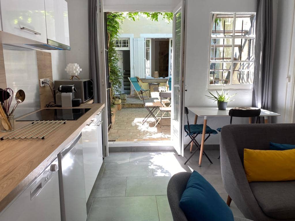 Salon Cuisine Appartement CC vue cour intérieur decoration chic